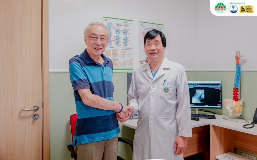 Associate Professor Ha Kim Trung, MD, PhD, with a Japanese patient treated for cervical spine infection